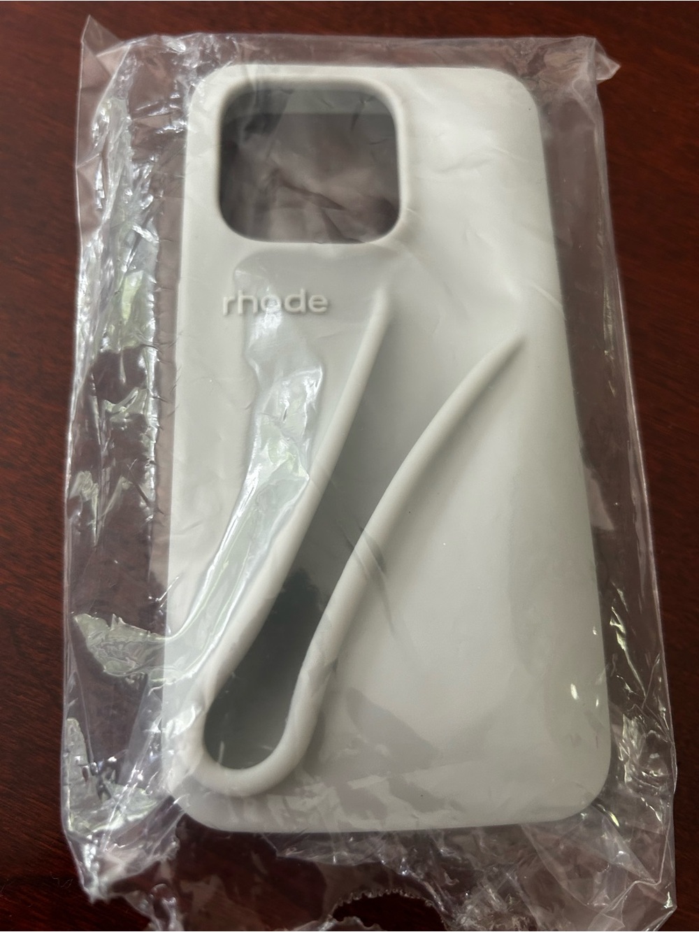 RHODE grey Silicone iPhone Case with Built-In lip gloss Loop